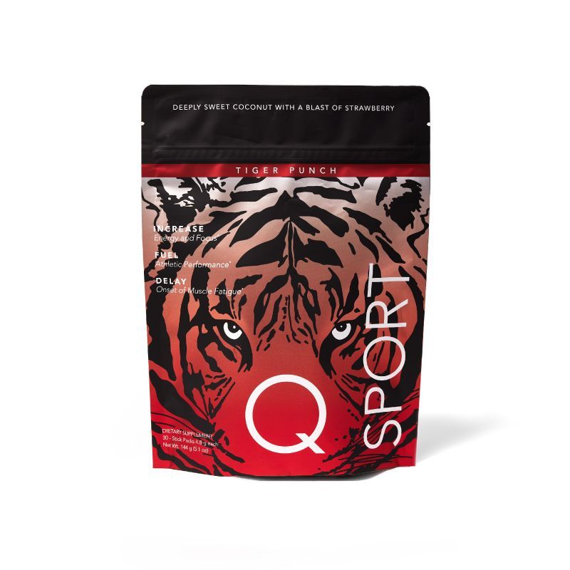 Package of Q Sport "Tiger Punch" supplement. Red and black tiger design with bold text highlights energy, focus, and athletic performance benefits.
