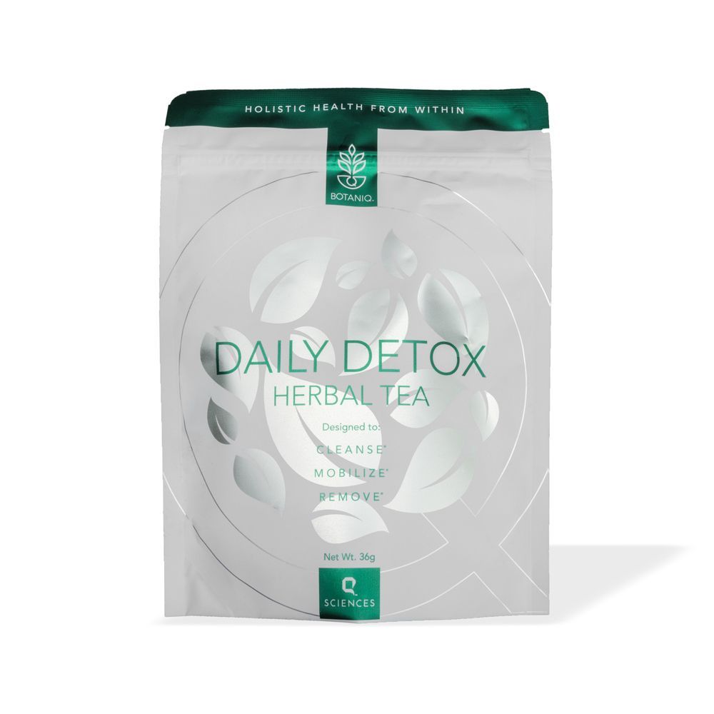 Packaging of BotaniQ Daily Detox Herbal Tea. Features a minimalist design with silver leaves, green accents, and text promoting cleansing benefits.